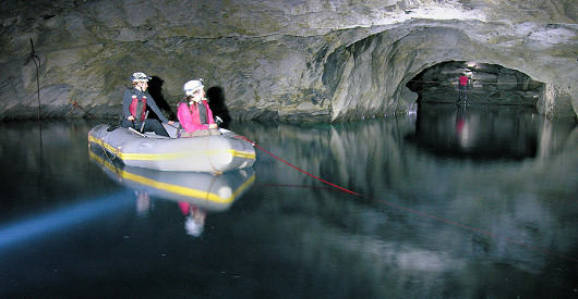 explorers crossing the lake in a boat